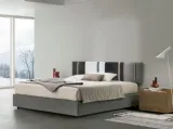 Letto sommier Diagonal con box contenitore e pannello testiera di Tomasella